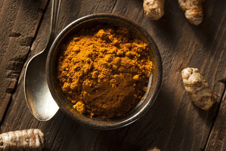 Raw Organic Turmeric Spice in a Bowl ** Note: Shallow depth of field